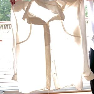 Women’s long sleeve button up blouse.